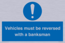 vehicles-must-be-reversed-with-a-banksman~
